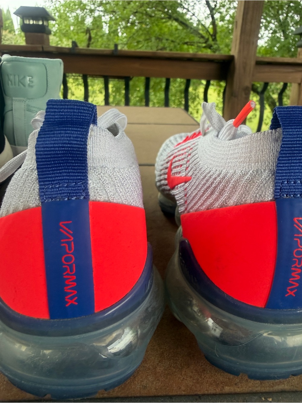 Nike White Flyknit vapor max  Sneakers with Bright orange and Royal Blue Accents